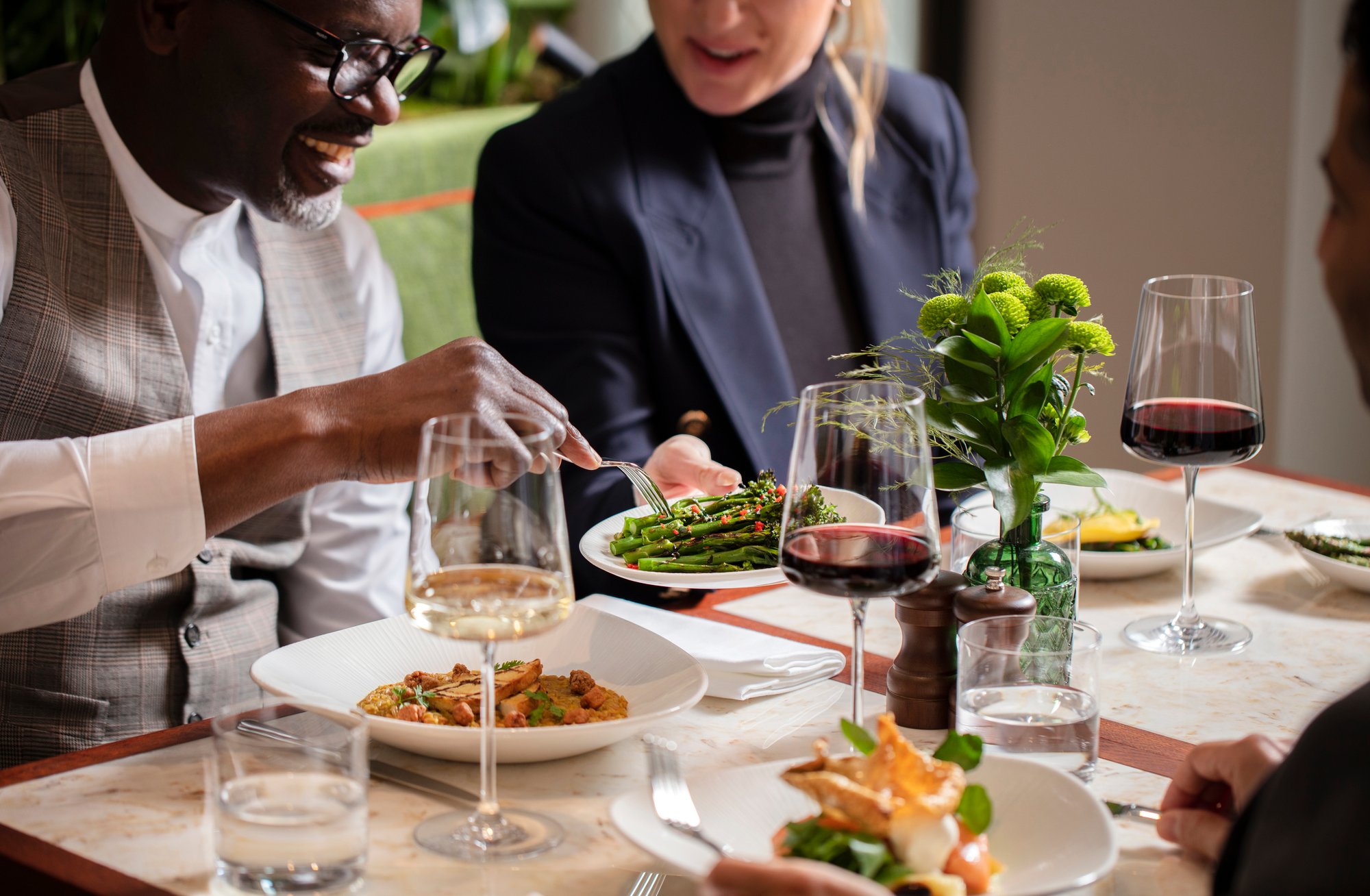 Two people enjoying food and having a conversation
