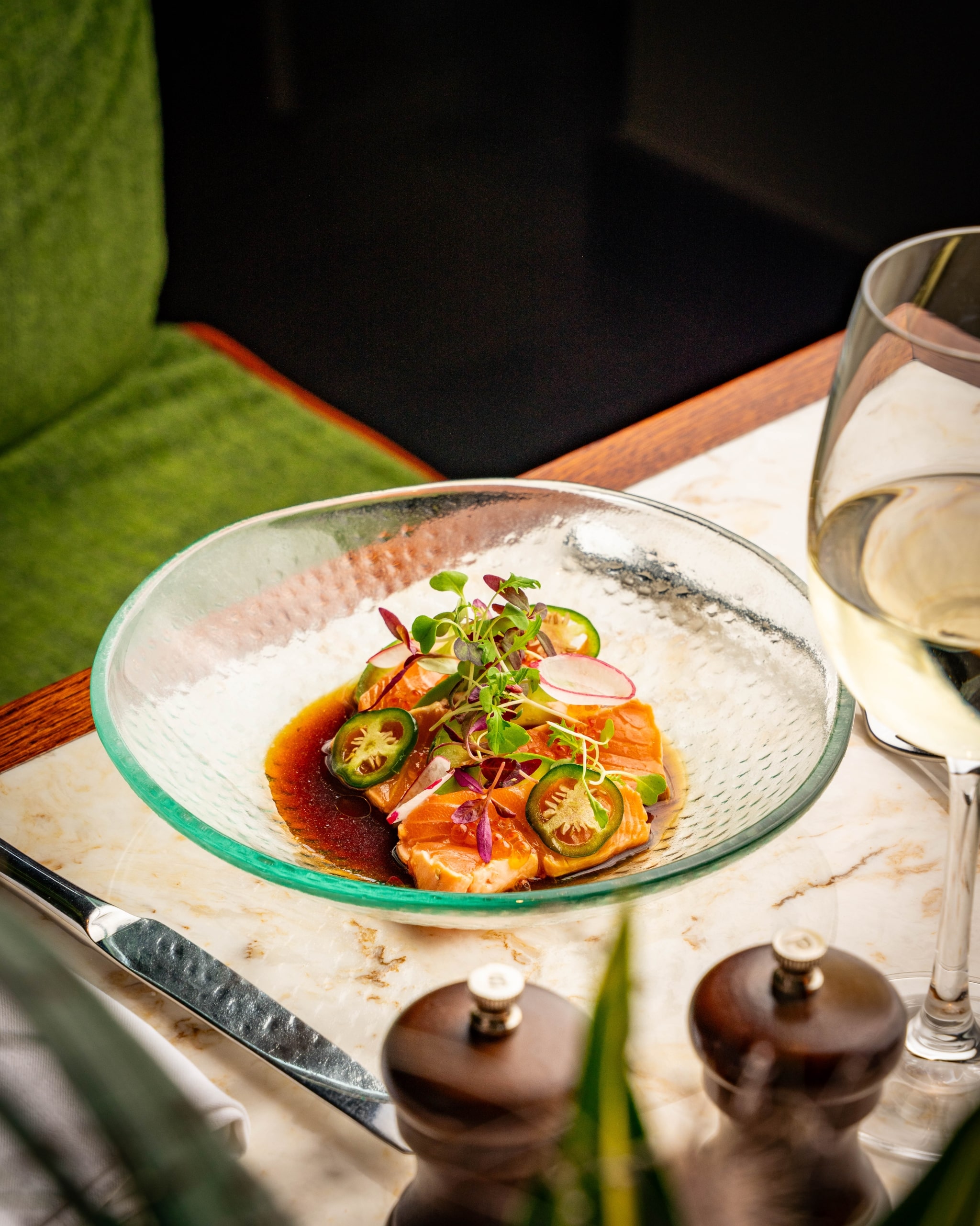 Close up view of a salmon dish in a bowl at The Cardinal