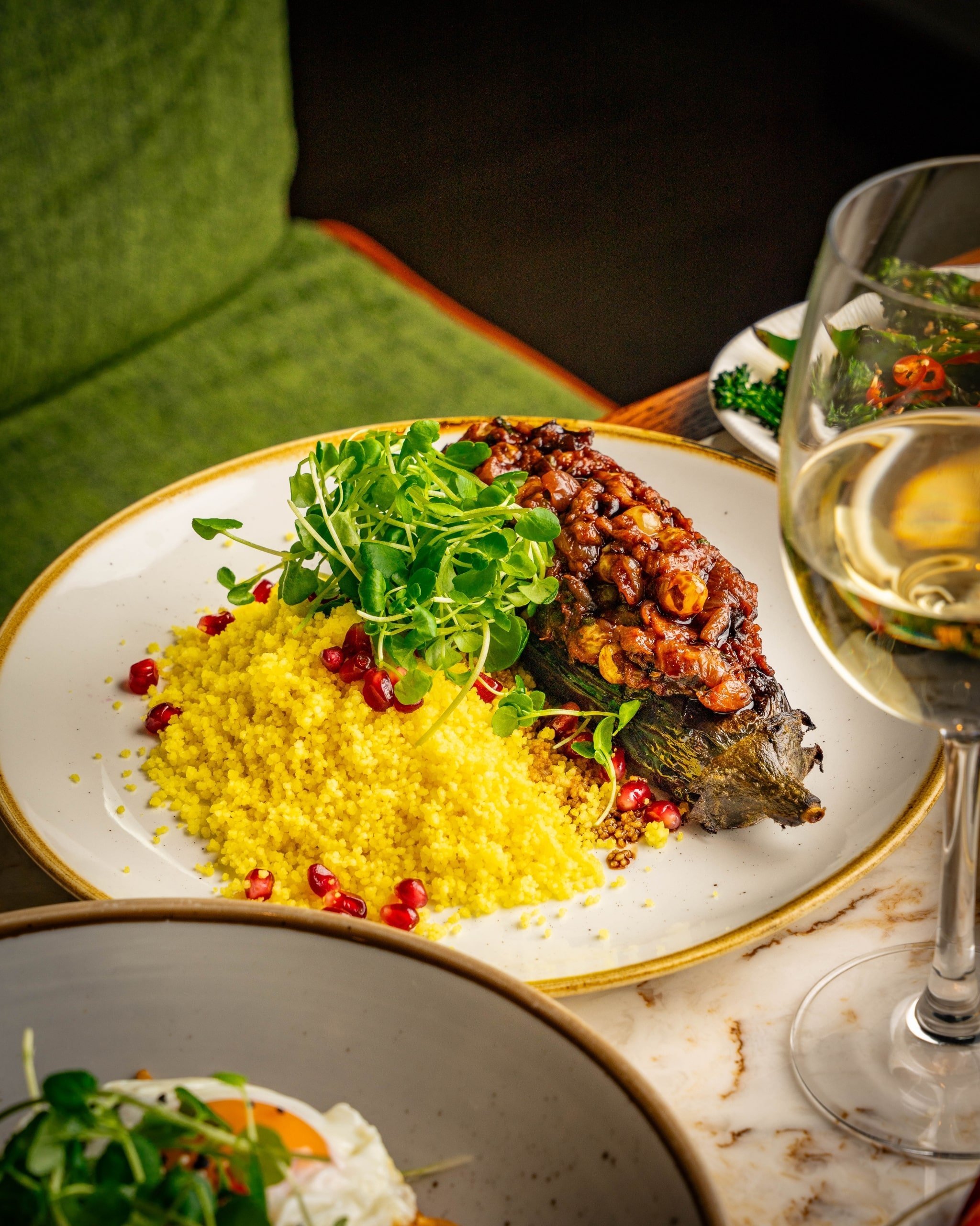 Plate of food on a table for dinner service prepared by The Cardinal