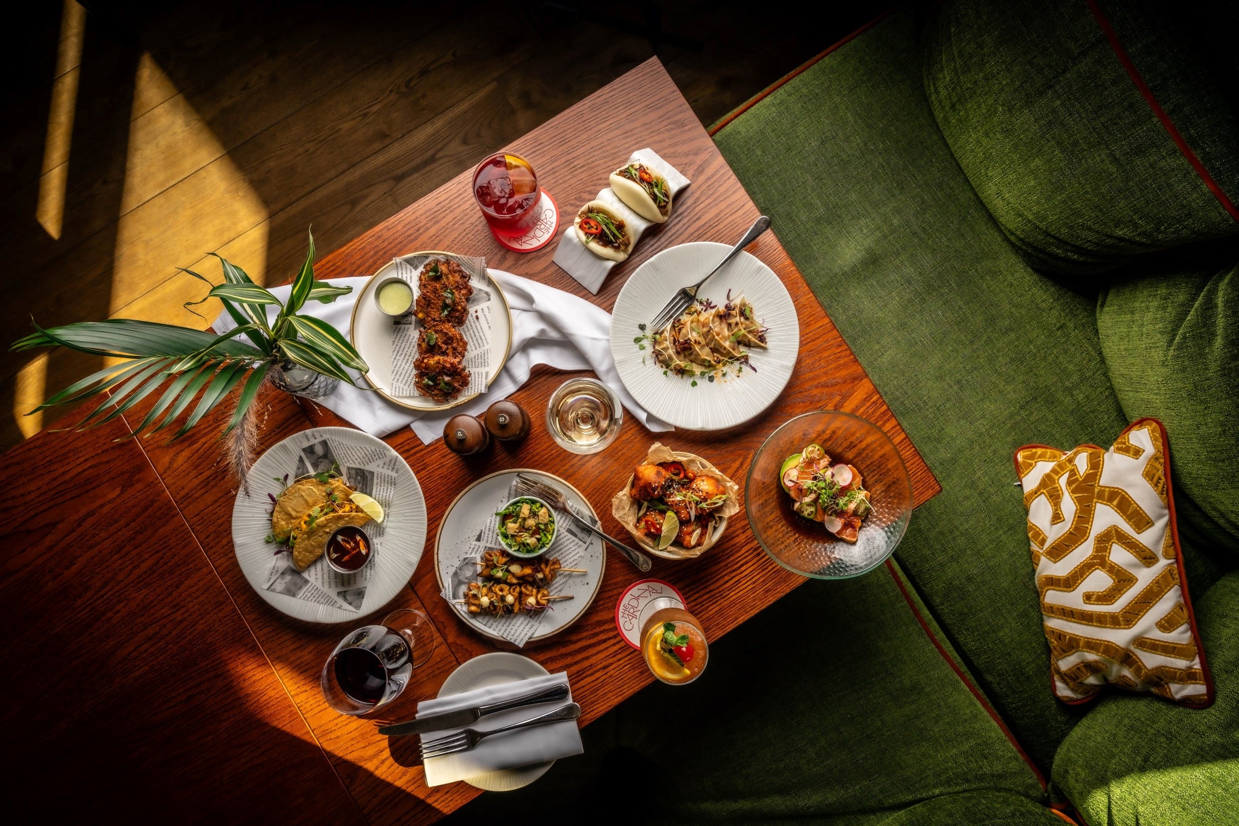 Birdseye view of food on a table prepared by The Cardinal