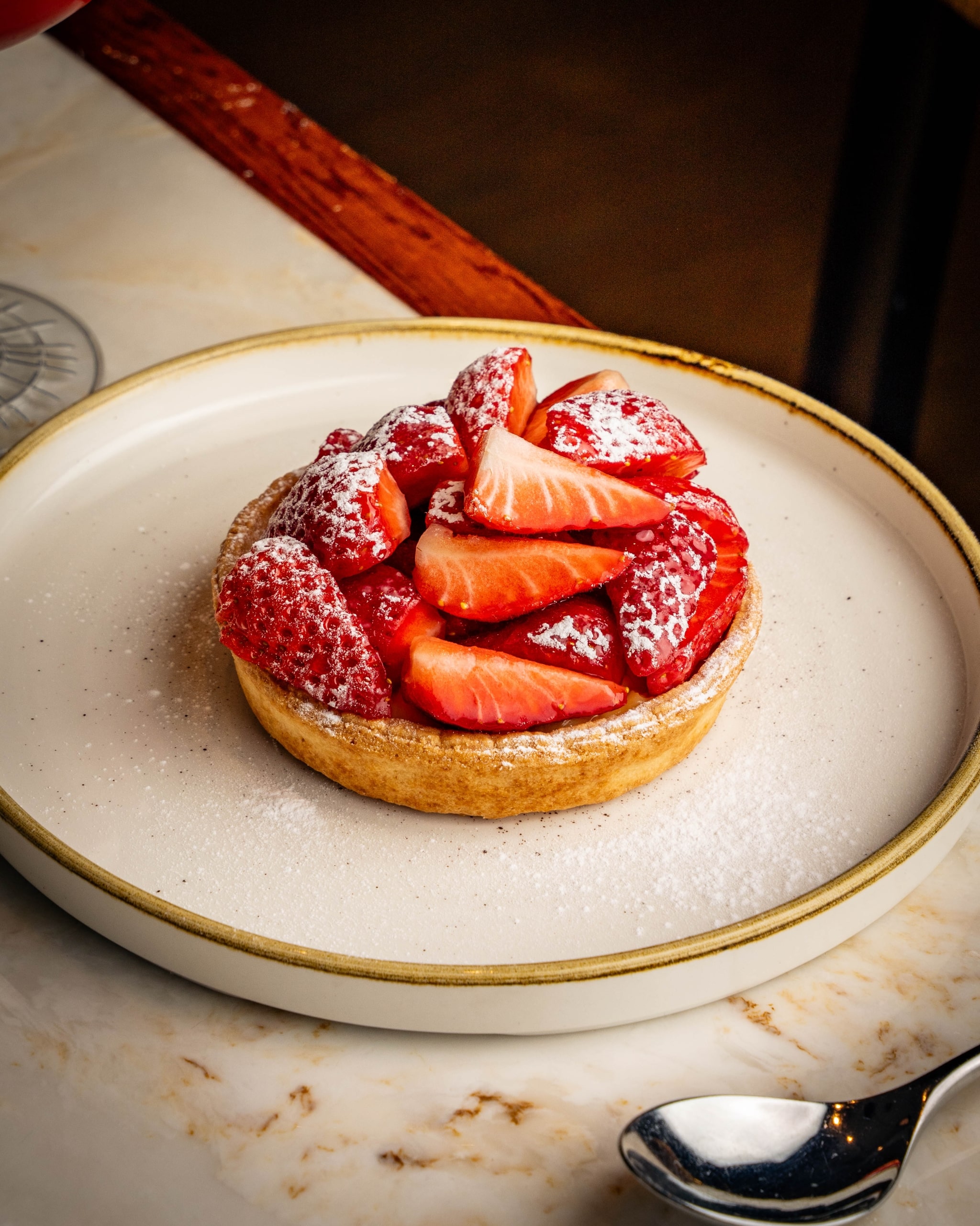 Close up of a strawberry desert prepared by The Cardinal